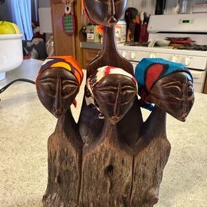Handcrafted Wooden Sculpture with Colorful Accents